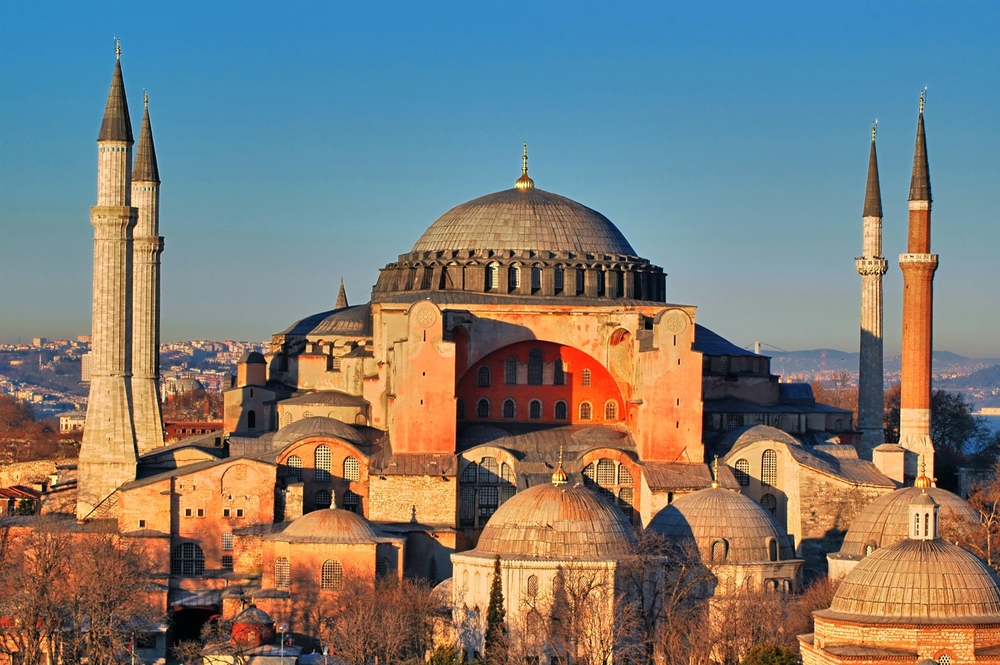 Hagia Sophia exterior with Ottoman minarets rising above Sultanahmet Square in Istanbul historic skyline
