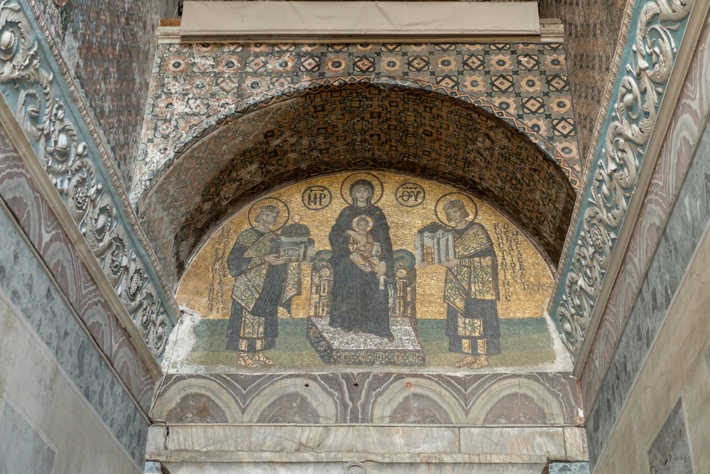Golden Byzantine mosaic inside Hagia Sophia showing historic Christian artwork and detailed religious figures in Istanbul