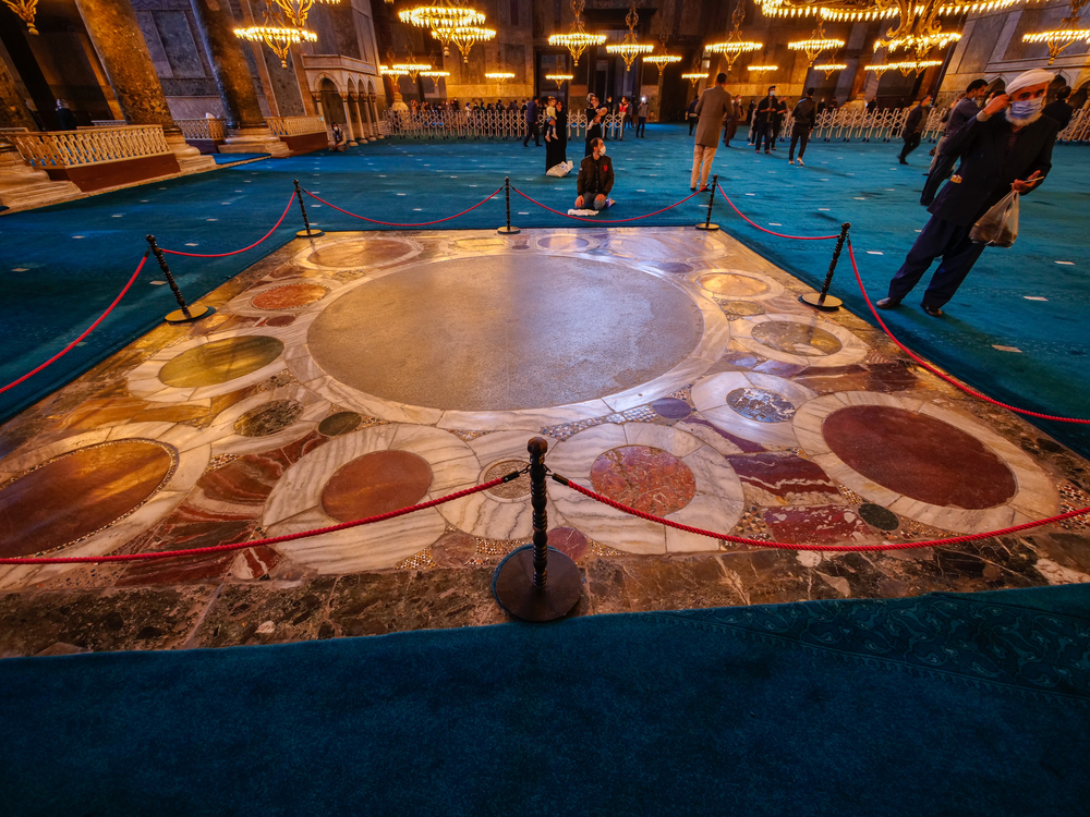 Hagia Sophia Omphalion marble floor with circular coronation stone pattern on the historic interior ground level